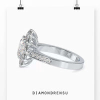 Oval diamond engagement ring, perfect for brides seeking timeless elegance.