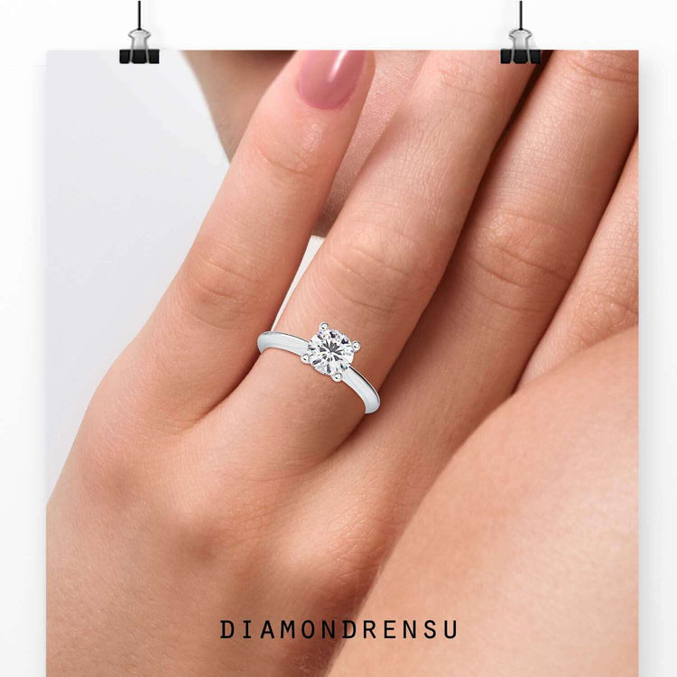 Round cut engagement ring showcasing a brilliant IGI certified lab-grown diamond in a classic solitaire style.