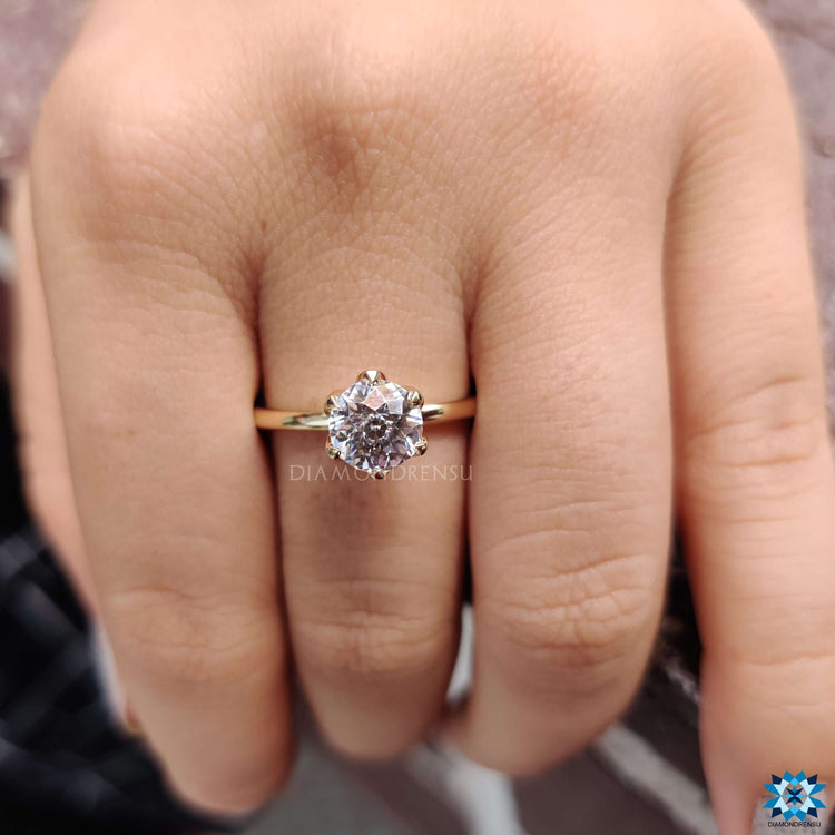 A fancy moissanite ring sparkling brilliantly, showcasing an elegant and modern aesthetic.