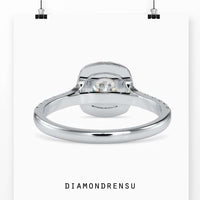 Round pave engagement ring featuring a brilliant diamond and elegant design.