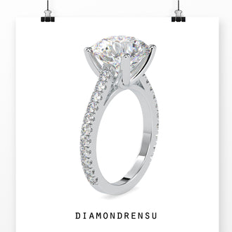 Round brilliant cut diamond ring with a 4 prong engagement ring setting.
