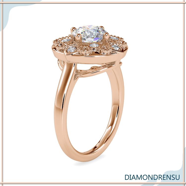 Milgrain halo engagement ring with a round diamond and unique detailing