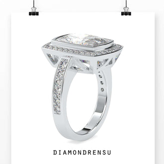 Stunning halo engagement ring setting with an elongated cushion cut lab diamond.