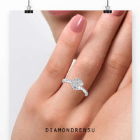 Twisted ring design with prong setting and round diamond accents