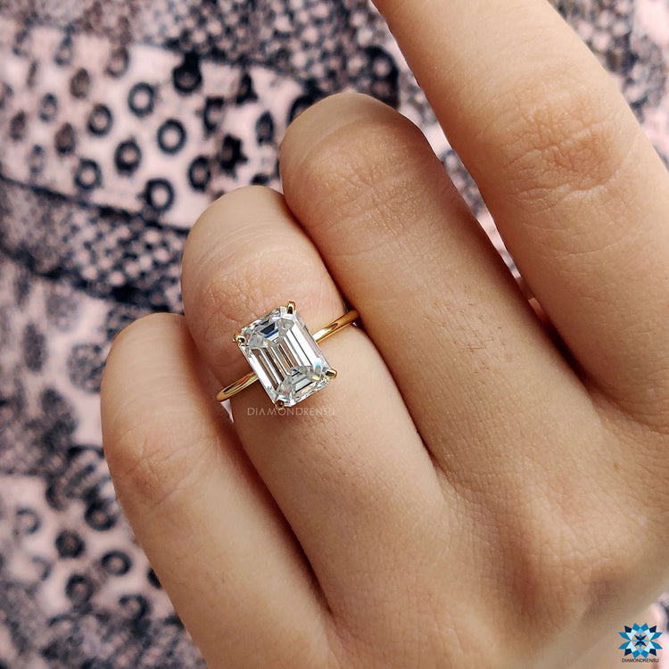 Chic moissanite solitaire ring crafted with a durable yellow gold engagement ring setting.