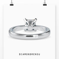 Simple gold ring with princess cut diamond and lab grown diamond accents