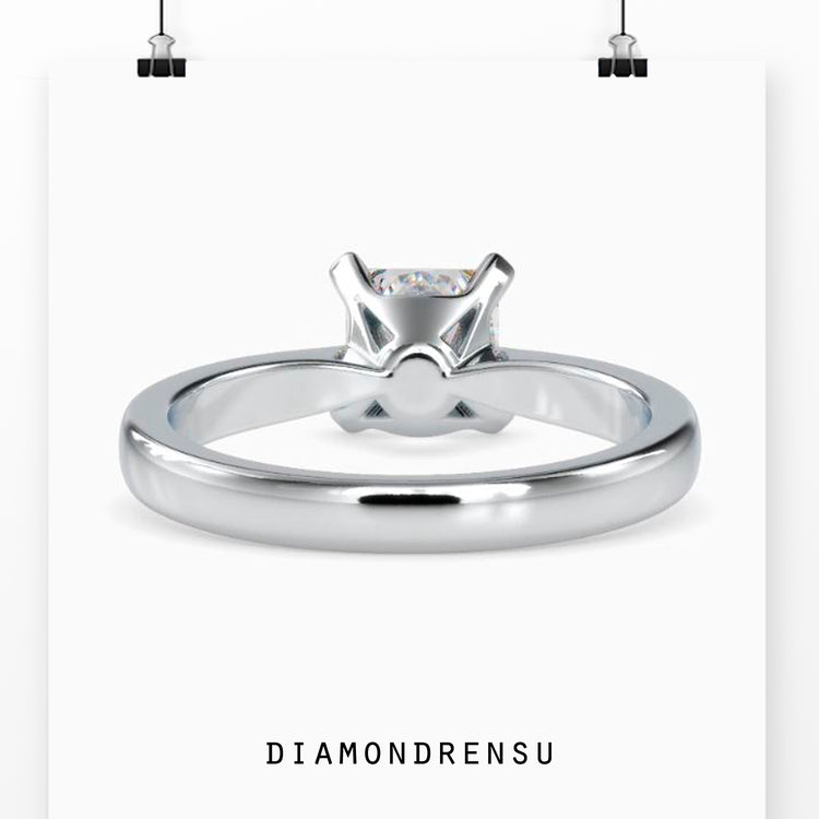 Simple gold ring with princess cut diamond and lab grown diamond accents