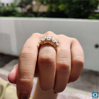 Round moissanite engagement ring with classic charm and sparkle.