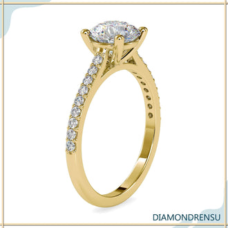 Pave ring setting with a four prong engagement ring design, featuring a round diamond.