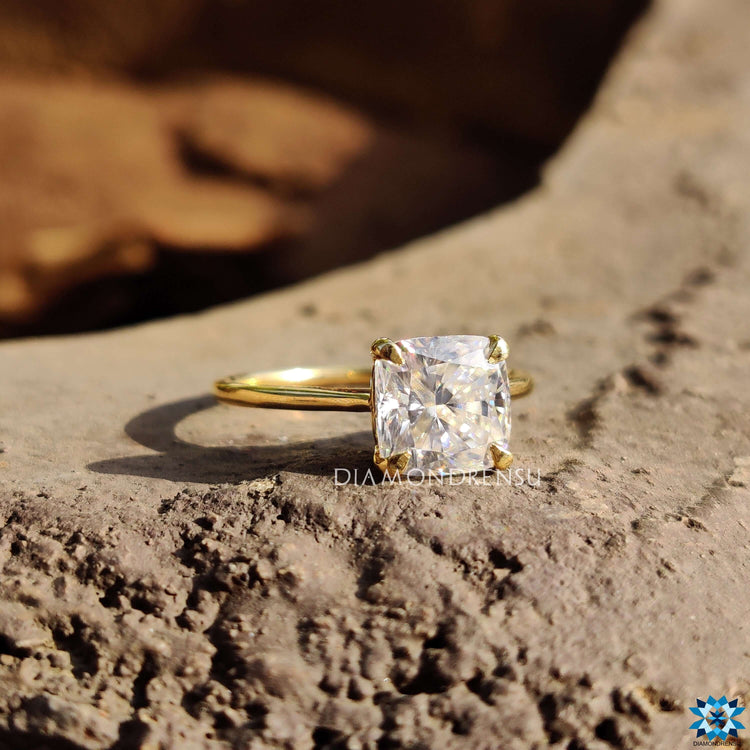 A dazzling cushion cut moissanite ring, perfect for a modern bride.