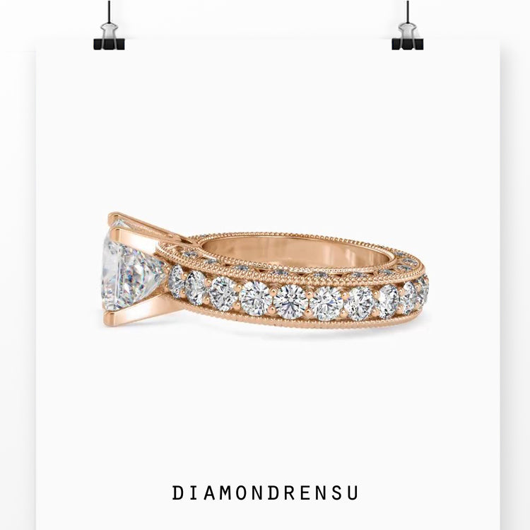 Beautiful engagement ring with a pave setting and shared prongs.