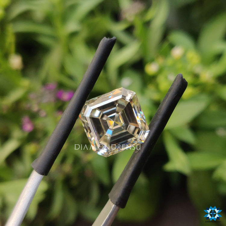 Loose stone available as a 0.69 carat moissanite asscher cut.