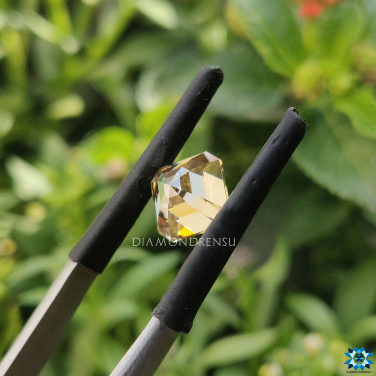 Loose moissanite shaped in asscher cut with 1.84 carat moissanite size.