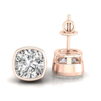 Elegant cushion cut diamond earrings in a bezel setting, perfect for formal occasions.