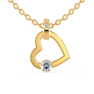 The tension set diamond pendant offers a modern, sleek look.