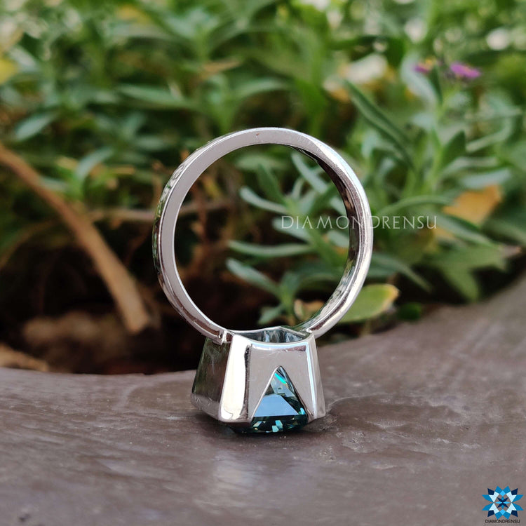 Half bezel moissanite ring offering sleek and unique details.