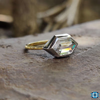 Hexagon cut ring offering brilliance and a bold geometric statement.