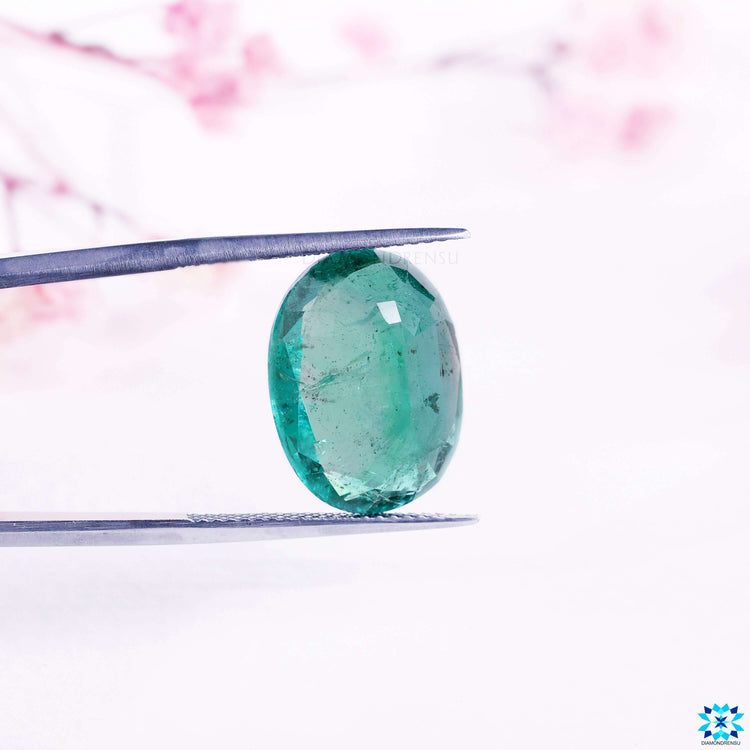 8.29 carat gemstone designed as oval cut emerald gemstone.