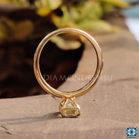 Moissanite emerald cut paired with a sleek, modern band.