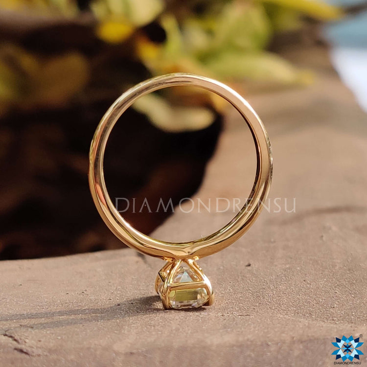 Moissanite emerald cut paired with a sleek, modern band.