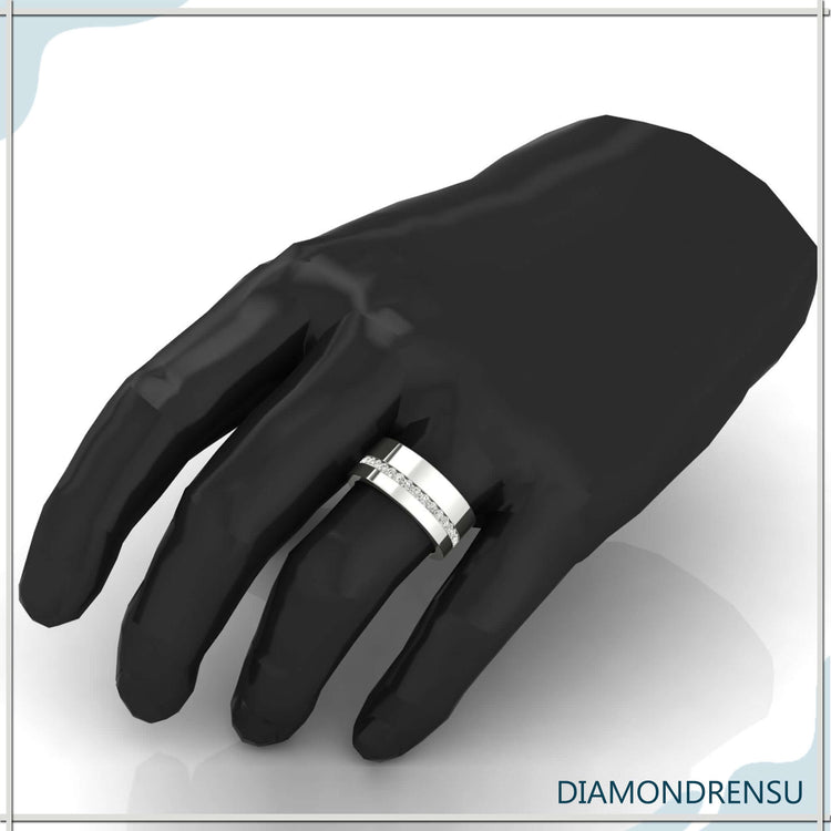 Mens channel set wedding band in sleek rose gold finish.