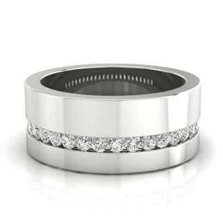 Channel set diamond band featuring round diamonds in gold.