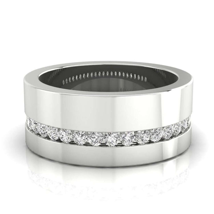 Channel set diamond band featuring round diamonds in gold.
