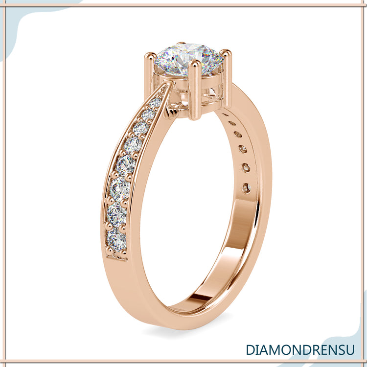 IGI certified 2 carat round diamond engagement ring with a 4 prong round setting.