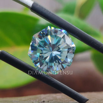 Cyan blue moissanite sparkling in octagon shape moissanite.