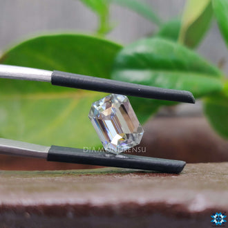 Near colorless gray categorized with emerald cut and loose stone.