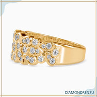 Pear bezel ring with a round brilliant cut diamond for a designer wedding band style.