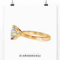 2 carat round cut diamond ring with a chic and modern twist.