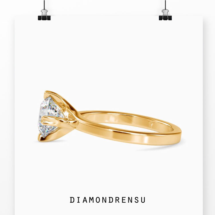 2 carat round cut diamond ring with a chic and modern twist.