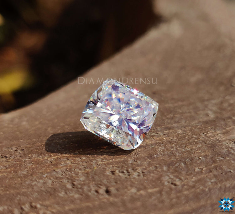 Loose moissanite stone in 5.18 carat cushion cut crafted for elegant custom jewelry.