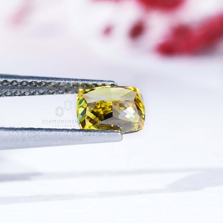 Loose lab grown yellow diamond elongated cushion cut.