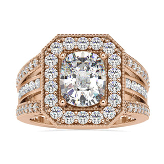 Vintage engagement ring with cushion cut diamond in a timeless setting.