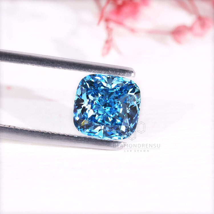 Cushion cut diamond shown in fancy blue 2.7 carat lab grown style.