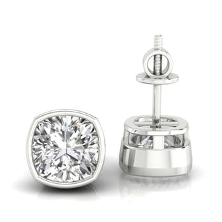 Cushion cut diamond earrings with a bezel setting, perfect for a timeless look.