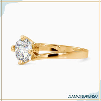 Bypass setting ring designed to highlight the beauty of a round diamond.