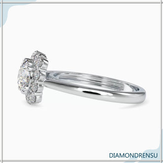 Cathedral setting engagement ring with a brilliant round diamond.