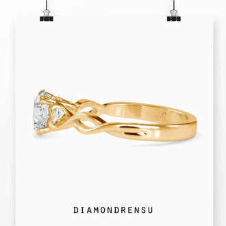 4 prong diamond ring with a brilliant round cut stone.