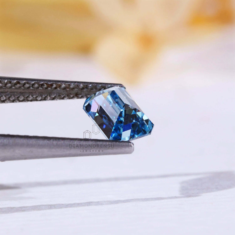 Loose blue diamond emerald cut diamond.