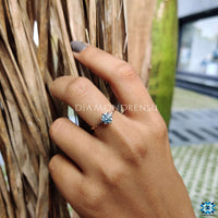 Cyan blue moissanite ring showcasing unique brilliance and vibrant colour.