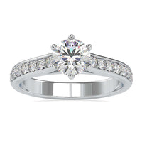 Pave band engagement ring with round diamond and pave setting