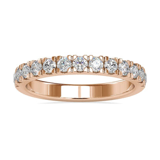 Diamond wedding band with round cut diamonds in a white gold setting.