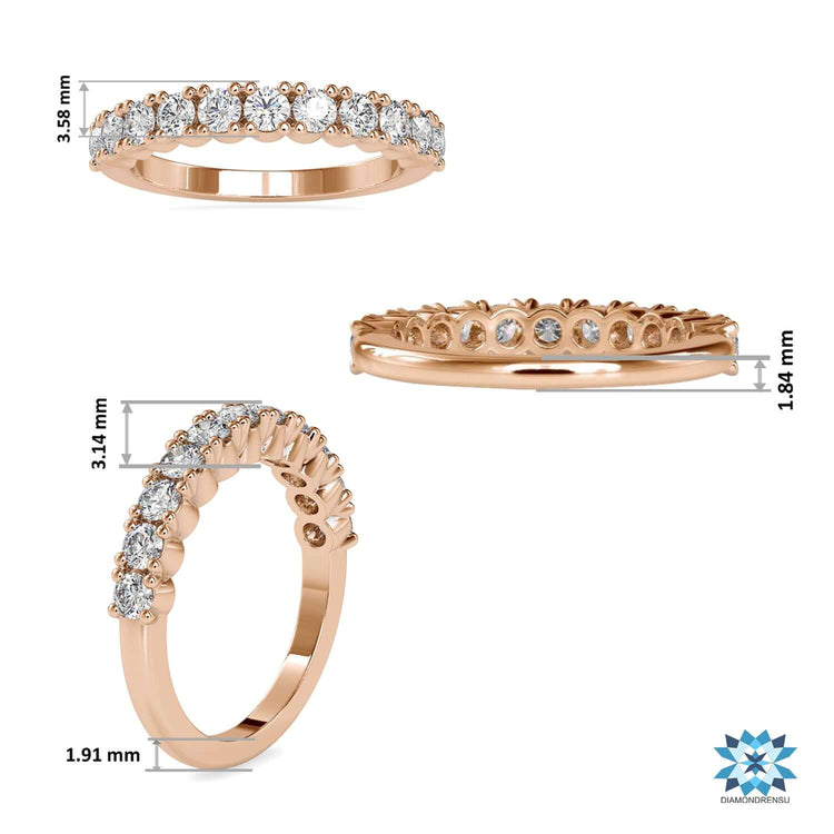 Diamond half band with round brilliant cut diamond in a prong setting.