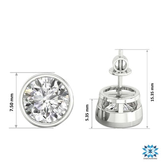 Dazzling simple silver earrings with round bezel diamond design for understated elegance.