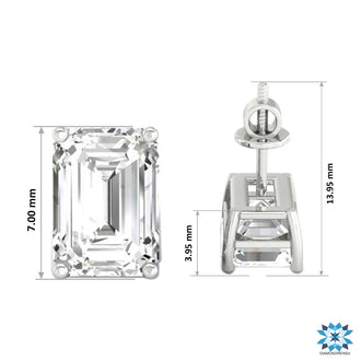 Emerald ear studs with diamonds, set in a 4 prong basket setting for secure wear.