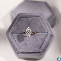 Moisanite engagement ring with a classic solitaire setting.
