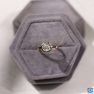 Minimalist round bezel ring for a sophisticated style statement.